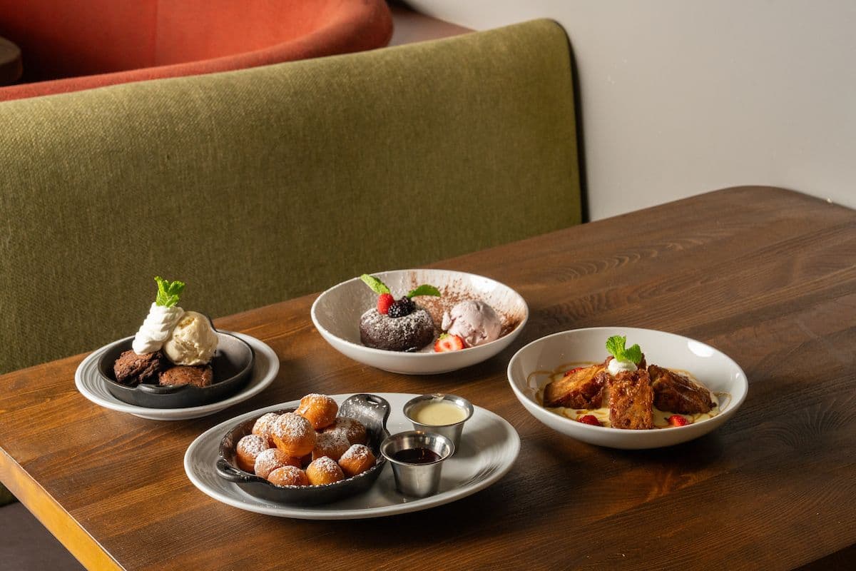 Spread of Sweet Donut Bites, Apple Bread Pudding, Chocolate Lava Cake, brownie and ice cream.